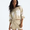 Maglia oversize corta in spugna da donna